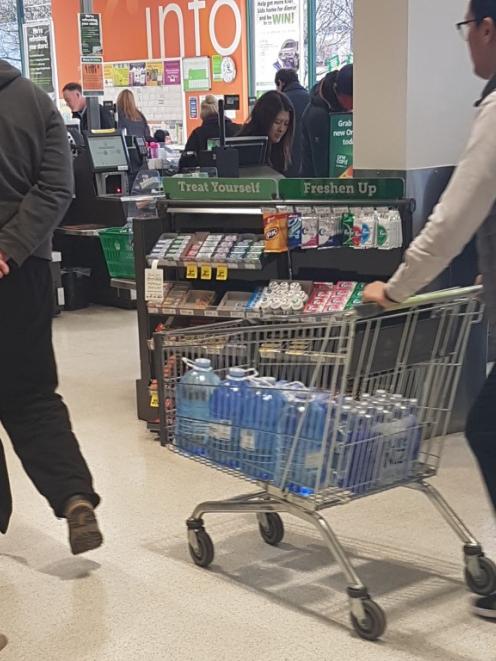 Bottled water was a popular item with Dunedin shoppers yesterday. Photo: Louise Frampton 