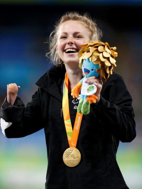  Anna Grimaldi celebrates with her gold medal during the presentation ceremony. Photo Reuters