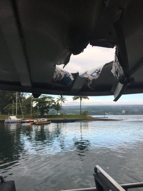 The force of the lava bomb punched a hole in the boat. Photo: Hawaii Department of Land and...