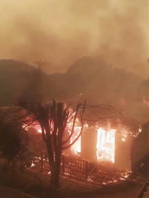 A house is destroyed in Mallacoota. Image: Kurt Crnic via Reuters 