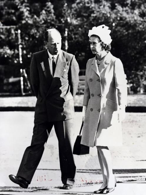 In good company: Nic Leefe escorts the Queen around Queenstown Gardens in March, 1970. Photo: via Mountain Scene