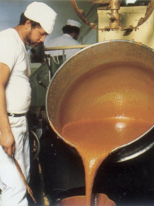La Faatoese pouring hot caramel destined for Picnic and Moro bars, during the 1980s. Photo:...