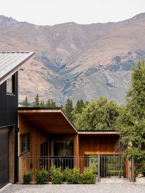 Rooms cascade down the site under a simple mono-pitch roof. Meanwhile, the garage at the top of...