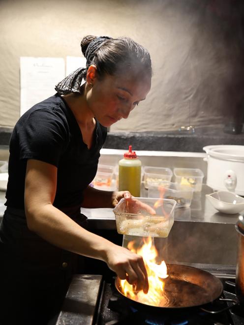 Paulina, of Paulina's, in Clyde hard at work on their lamb shank dish. 