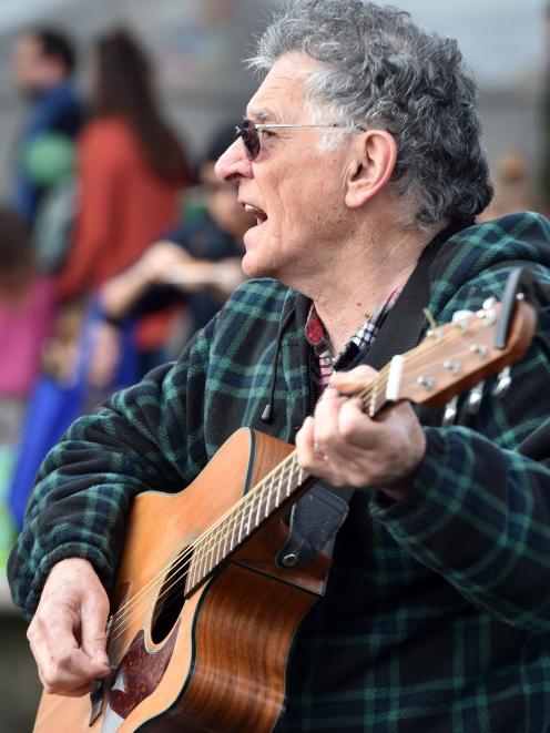 Playing a cover of We Can Get Together by the Australian band Icehouse is Mig Smith, of Dunedin.