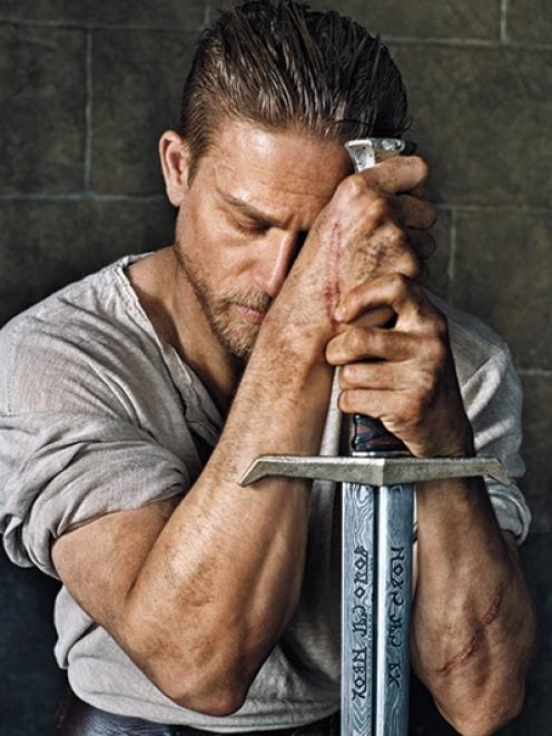 Charlie Hunnam as King Arthur in the Warner Bros movie.