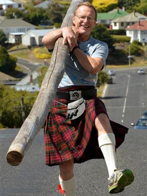 Caledonian Society of Otago member Ian McDonald with the caber needing a lift to Queenstown for the New Zealand Rural Games. Photo by Stephen Jaquiery