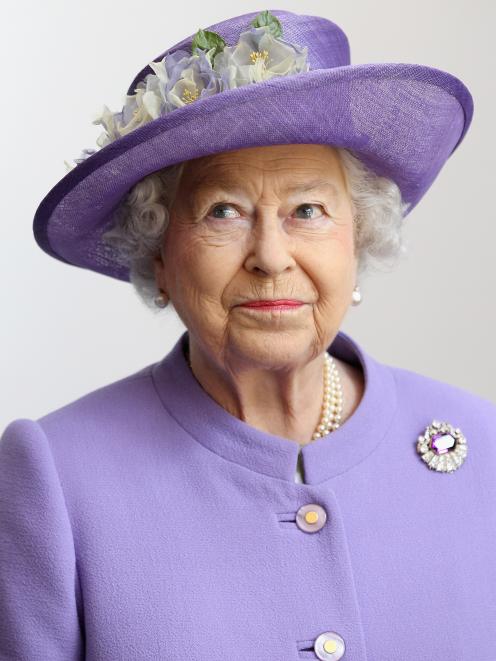 Brightly coloured outfits with matching hats have become staples in the Queen's wardrobe. Photo:...