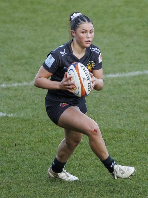 Maddie Flutey playing for the Exeter Chiefs against the Bristol Bears during their Premiership...
