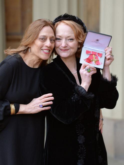 Stella Duffy (right) with partner Shelley Silas after she received her Officer of the  Order of...