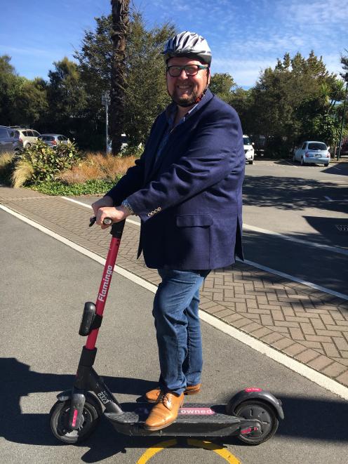 Waimakariri Mayor Dan Gordon on a pink e-scooter. Photo: David Hill / North Canterbury News 