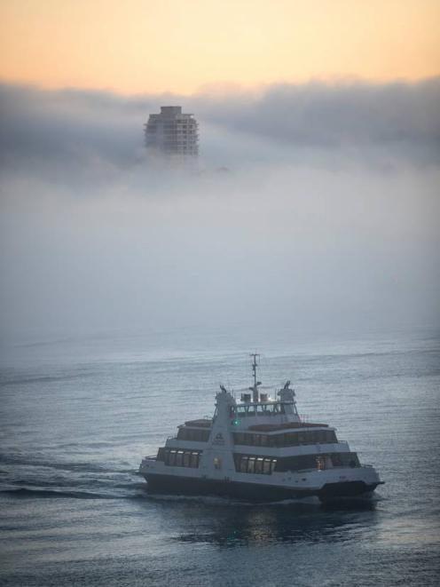 Early morning fog Auckland CBD waterfront. Photo: NZ Herald