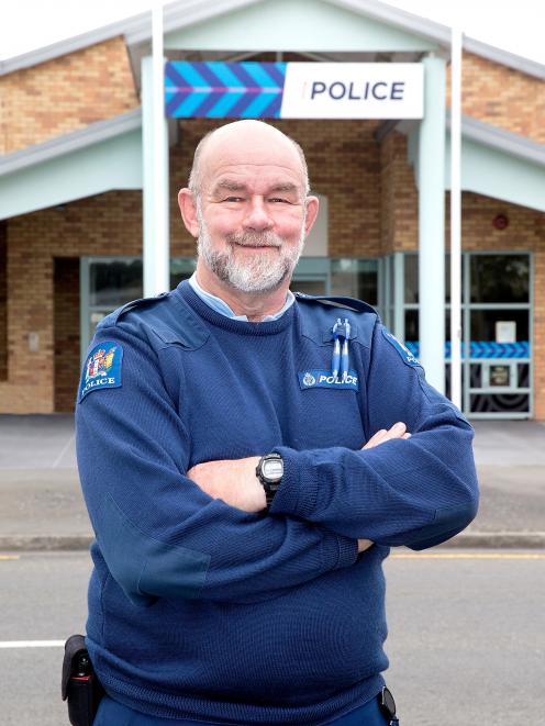 Senior Constable Garry Bombay switched from the beat to the front desk at New Brighton police...