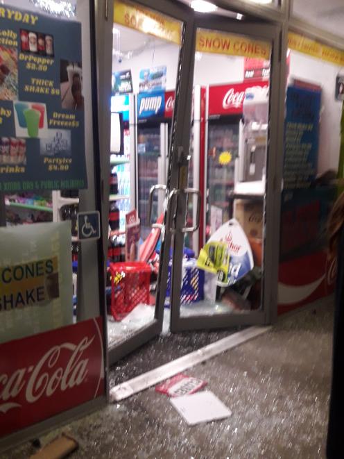 The damaged door of the Lincoln dairy. PHOTO: BARRY CLARKE/STAR NEWS 