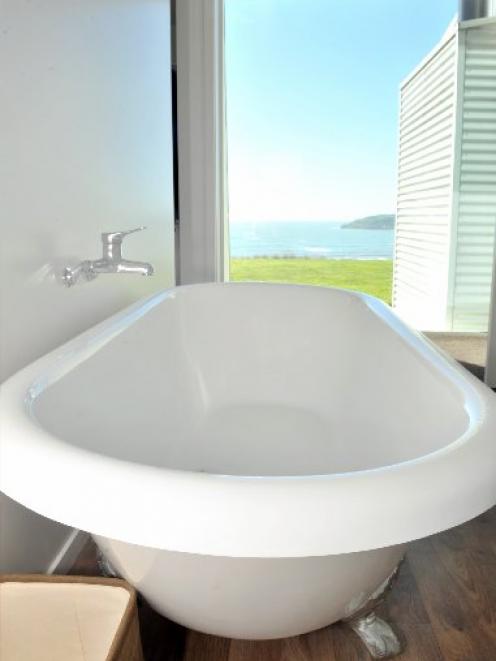 The bath in the en suite is perfectly positioned for the view.