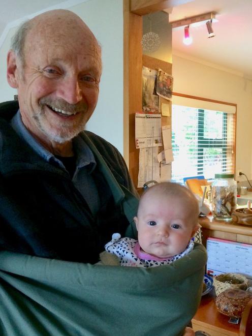 Author and conservation educator Neville Peat with his granddaughter Grace, who was born this 
...
