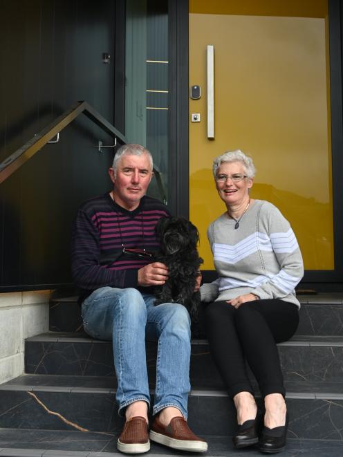 Stan and Heather Rivett with their dog, Trixie.