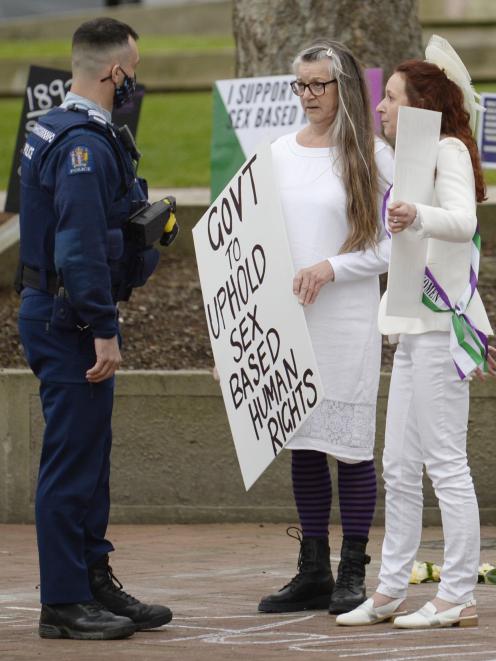 Tracey Crampton Smith (centre) and Jennifer Scott are spoken to by police after an alleged...