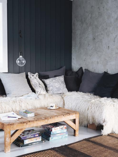 A spectrum of greys has been used in this modern monochrome look, but despite the cool shades, a...