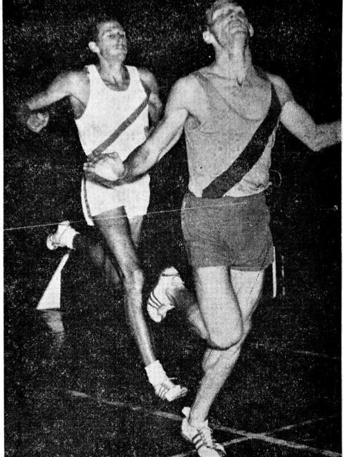 Peter Snell crosses the line first just in front of John Davies at the Caledonian Ground in...