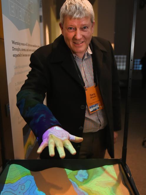 Prof Gary Wilson with an interactive display at Otago Museum depicting warming oceans. PHOTO:...