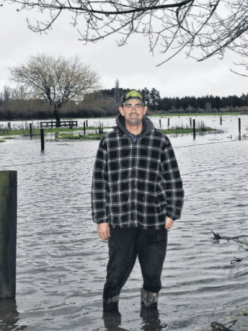 Harness racing trainer Bob Butt at the flooded Woodend Beach training property owned by his...