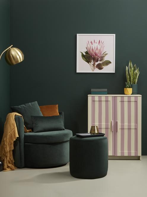 Moody, with a hint of vitality, deep velvet hue of Resene Palm Green used walls creates a...
