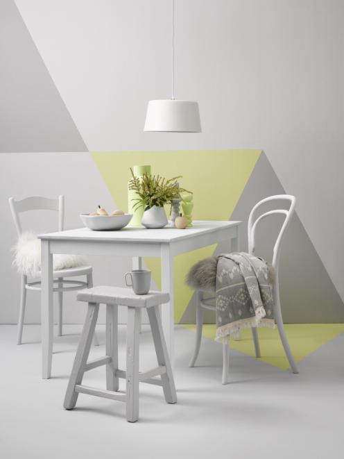 The darker tones of Resene Quarter Stack against the contrasting yellow Resene Hypnotic and walls...