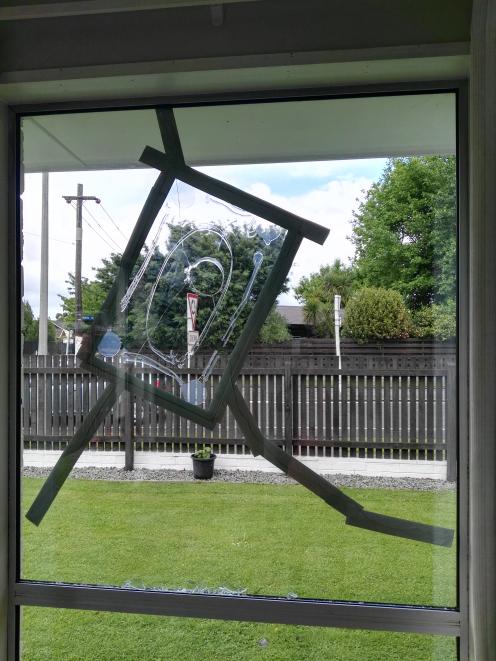 A rock was thrown through a window at Sandra Dougall's Highsted Rd property.