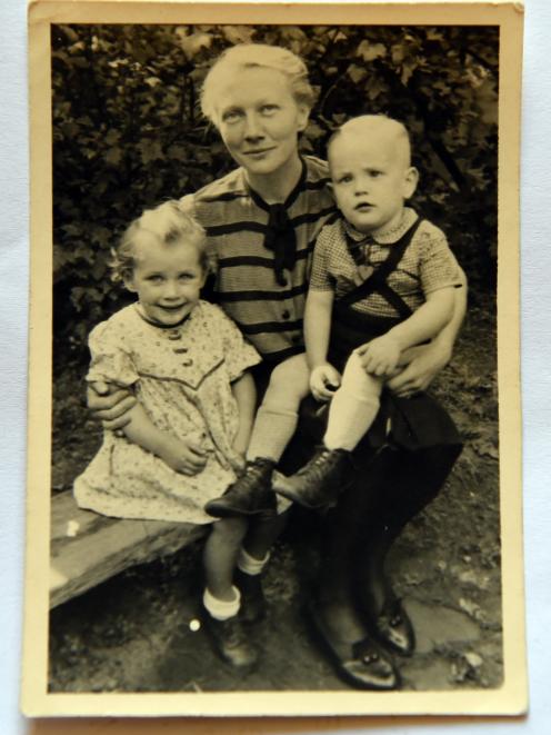 In 1943, Lilo, widowed, poses for this photograph with her two children Heinke and Hartmut. 