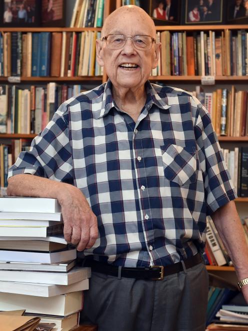 Stan Rodger, surrounded by books in his home office. PHOTO: PETER MCINTOSH