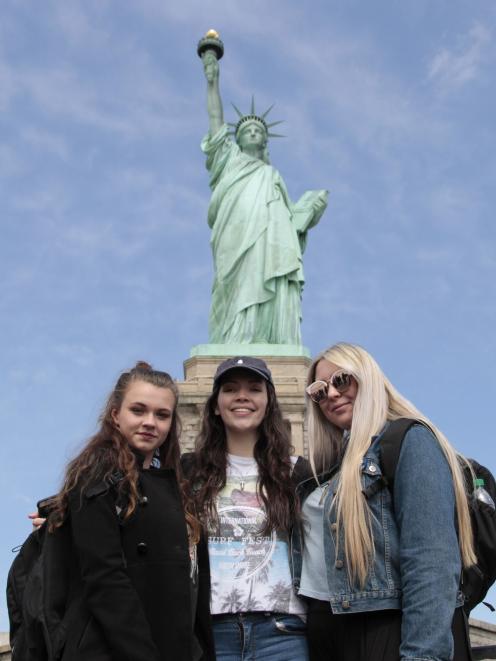 Pupils Stella Cooper, Belle Williams and Laura Hay in front of the Statue of Liberty. PHOTO:...