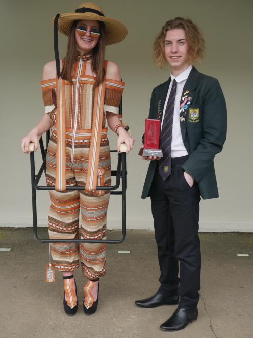 Bayfield High School pupil George Park  shows  the outfit,  modelled by fellow pupil Tahlia...