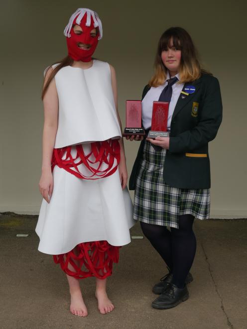 Eden Poll models the outfit designed by  fellow  Bayfield High School pupil Alice Parsons  which...