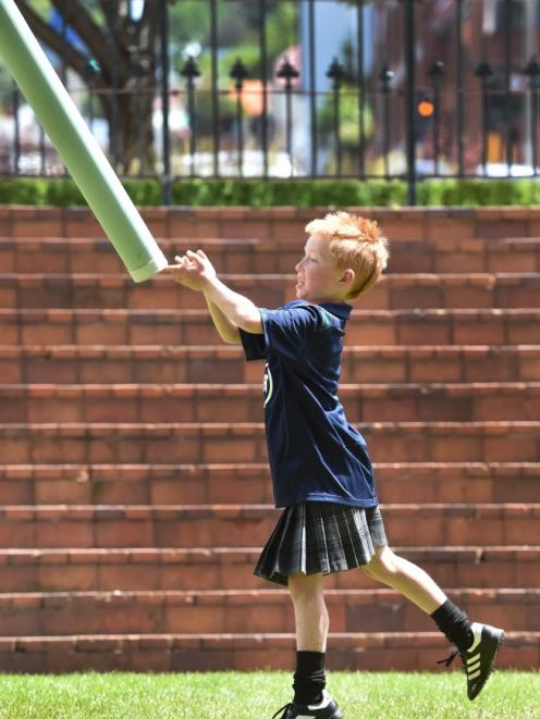Highland games . . . Max Collins (then 8), of Dunedin, throwing a plastic Caber during the 2020...