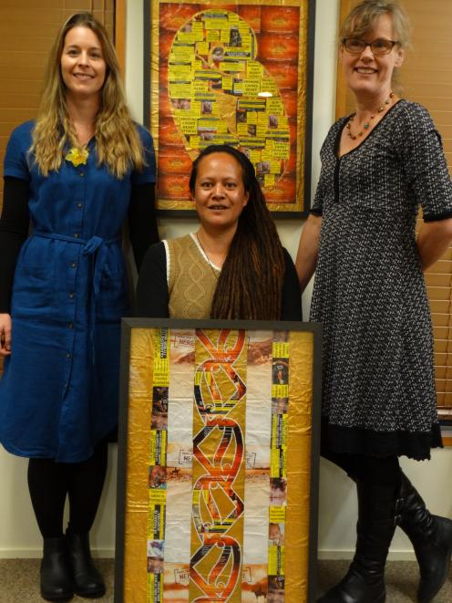 Palmerston-based artist Annejennette Maki (centre) is joined by Cancer Society Otago-Southland...