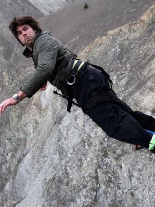 Tom Palmer, the England lock, dives off at the 134m high Nevis Bungy. Photo by Getty