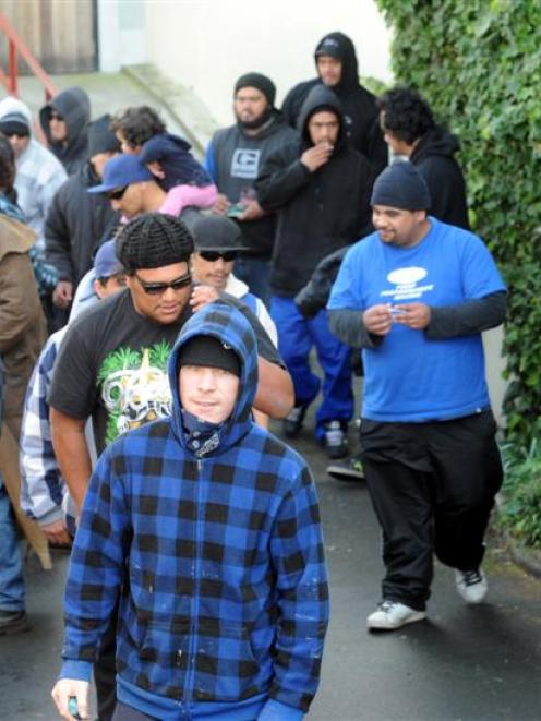 Black Power members leave a gathering protesting the new bylaw to ban gang patches in Wanganui....