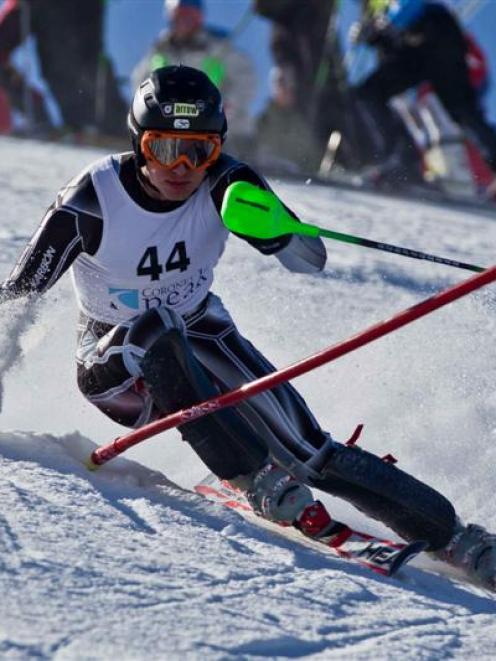 2011 Super G, giant slalom and slalom national champion Ben Griffin, of Ohakune, competes during...