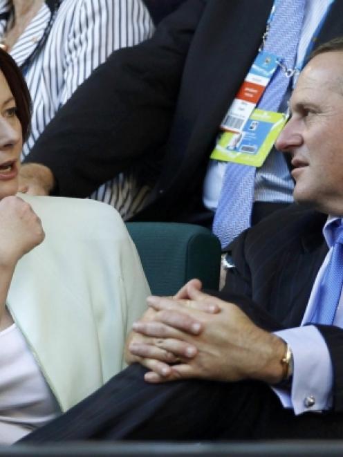 Australian Prime Minister Julia Gillard speaks to New Zealand Prime Minister John Key before the...