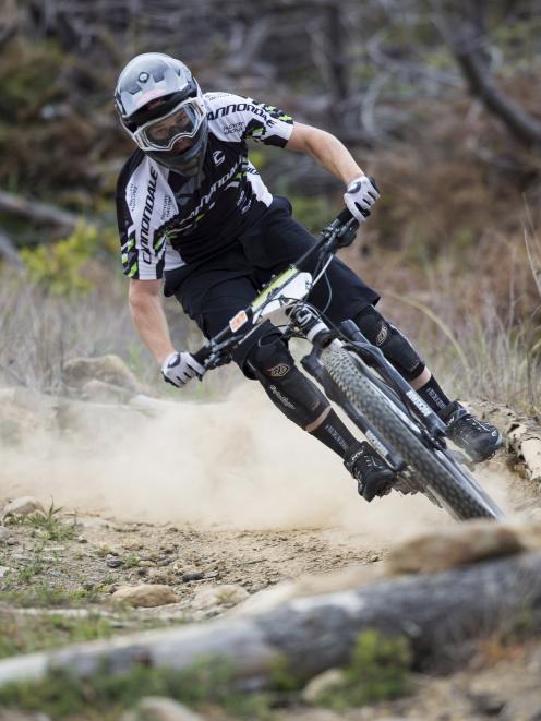 Anton Cooper descends a trail on Signal Hill during stage four of the Three Peaks enduro event...