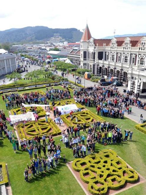 350 is spelled out in front of the Dunedin Railway Station by people visiting the Spring Food...