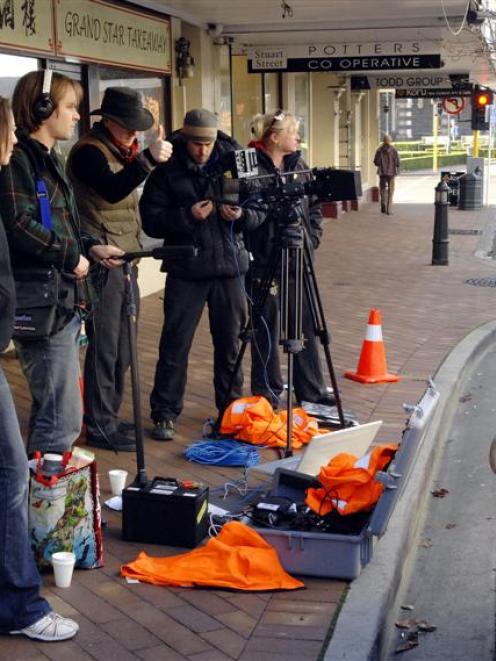 38 Pictures crew film episode four of Casebook in Lower Stuart St, Dunedin, yesterday. (From left...