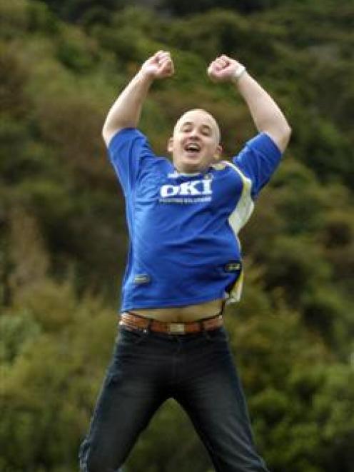 Portsmouth supporter Ben Holmes starts the celebrations early. His team will play Cardiff City in...