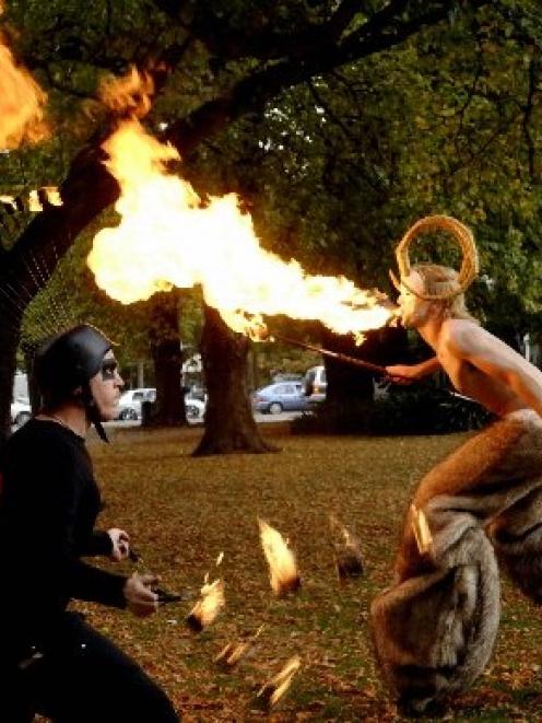Highly flammable performers Dan Hendra (left) and Neil Dudley light up the Otago Museum Reserve....