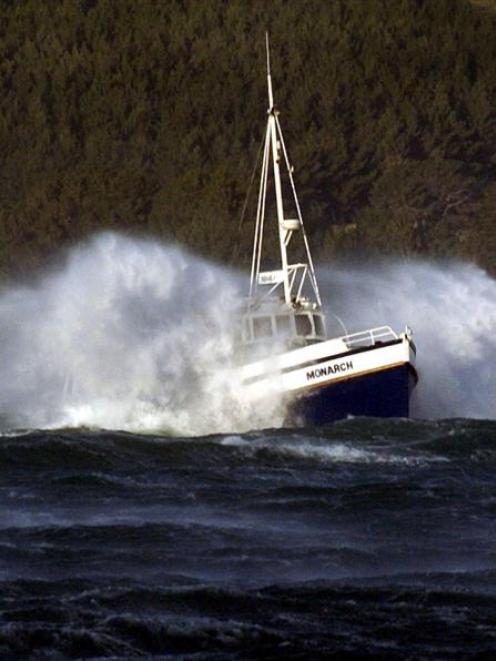 'Monarch' powers its way through heavy seas inside Otago Harbour about 4pm yesterday. Photo by...