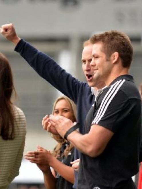  Prince William celebrates a   try in the company of All Black captain Richie McCaw at Forsyth Barr   Stadium. Photo by Peter McIntosh