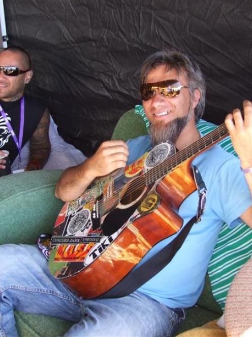 Solo musician Tiki Tane and Little Bushman's Warren Maxwell (right) relax backstage at Rippon...