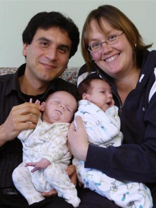 Dunedin couple Parviz and Kelli Najafi with their twins Arian (left) and Rania, the first...