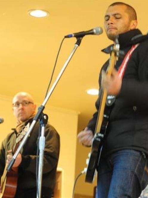 Opshop guitarist Matt Treacy (left) and singer Jason Kerrison perform at Fairfield School...